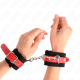 Белезници KINK - NYLON WRIST RESTRAINTS BLACK WITH LEATHERETTE RED ADJUSTABLE 19-24 CM X 5.5 CM